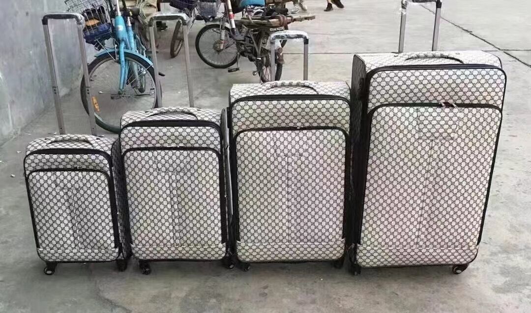 Vendita in vendita all'ingrosso 20/24/28 pollici PU cuoio valigia bianca set di bagagli a rotazione