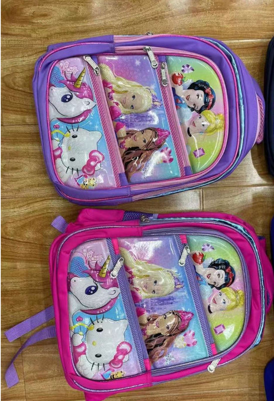 Nuovo ingrosso di zaini in tre pezzi per gli studenti delle scuole elementari delle classi 2-3 5-6 borse di pelle cartoni animati
