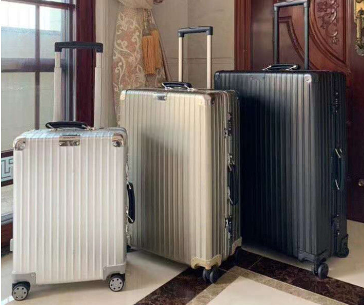 Vendita a caldo Tutto alluminio magnesio lega Vintage bagagli da viaggio Unisex Portatile TSA Custom Lock Valigia ruote giratrici Manufa