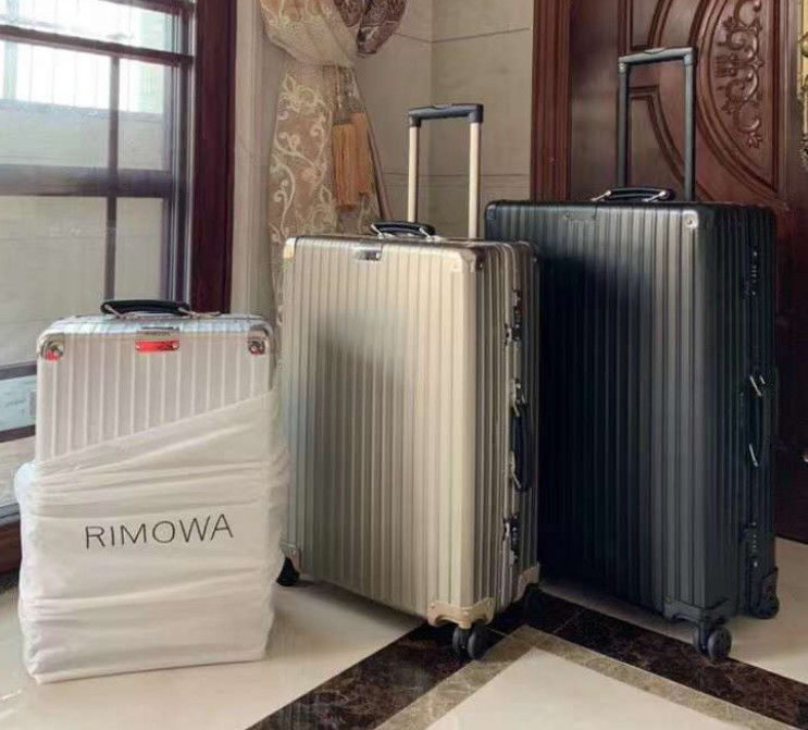 Vendita a caldo Tutto alluminio magnesio lega Vintage bagagli da viaggio Unisex Portatile TSA Custom Lock Valigia ruote giratrici Manufa