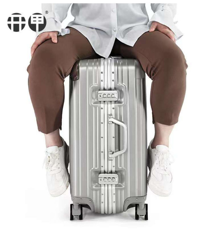 Nuova ultima valigia da viaggio ABS+PC Universal Wheel Zipper Trolley Box Drag Leather Box Box Code Box Luggage Wholesale