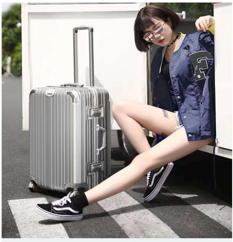 Nuova ultima valigia da viaggio ABS+PC Universal Wheel Zipper Trolley Box Drag Leather Box Box Code Box Luggage Wholesale