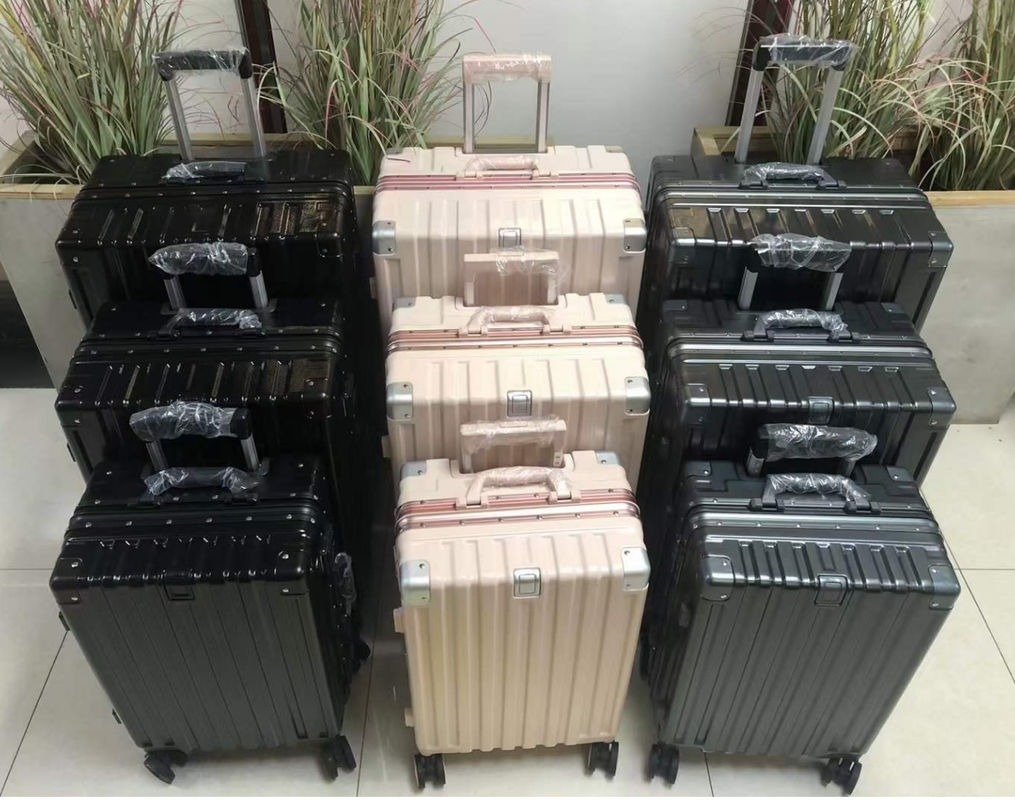Nuovi arrivati portano con sé bagagli Carrozzina di viaggio a guscio duro 4 ruote a giratore Valigia leggera con serratura TSA